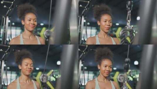 年轻美丽的非裔美国女运动员在体育馆锻炼。高清在线视频素材下载