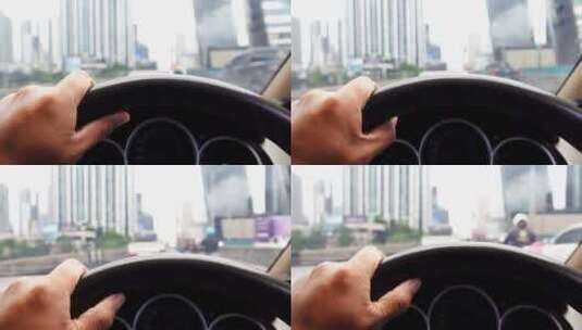 男子手扶方向盘驾驶车辆第一视角高清在线视频素材下载