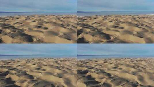 青海湖岸边天空沙丘高清在线视频素材下载