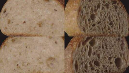 亚麻籽面包，切片。黑色背景上的旋转。高清在线视频素材下载