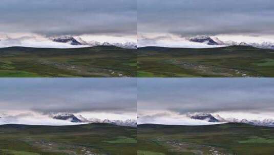 川西草原远望云海中的贡嘎雪山高清在线视频素材下载