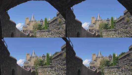 穿过门看中世纪城堡的塔楼高清在线视频素材下载