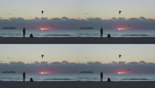 海边夕阳日出情侣剪影高清在线视频素材下载