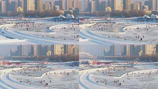 哈尔滨松花江上冬季冰雪嘉年华航拍高清在线视频素材下载