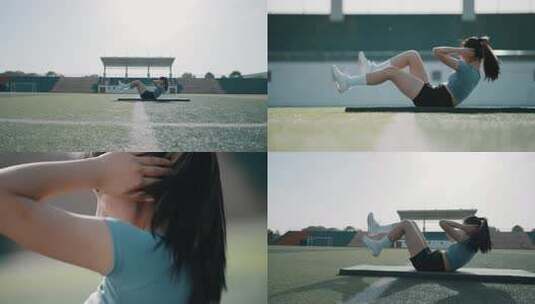 女子户外草坪做仰卧起坐高清在线视频素材下载