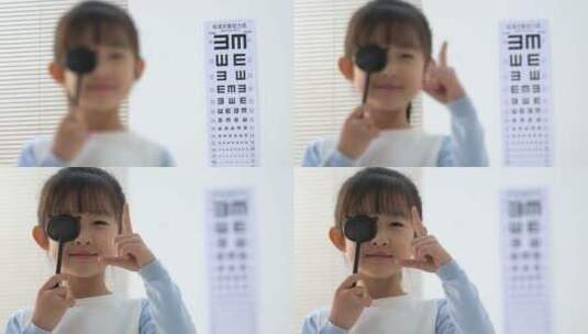 可爱的小女孩测试视力高清在线视频素材下载