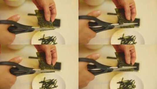 剪刀剪海苔片高清在线视频素材下载