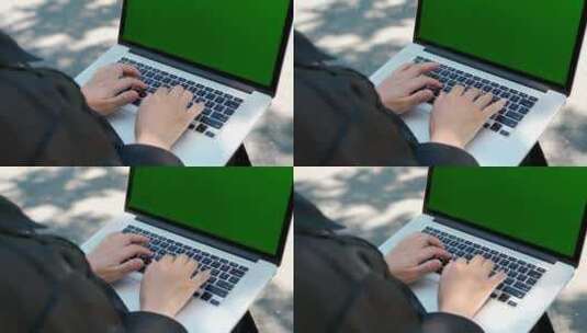 坐在公园长椅上使用笔记本电脑办公的美女高清在线视频素材下载