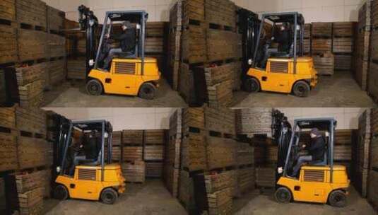 搬运卡车搬运仓库中的箱子高清在线视频素材下载