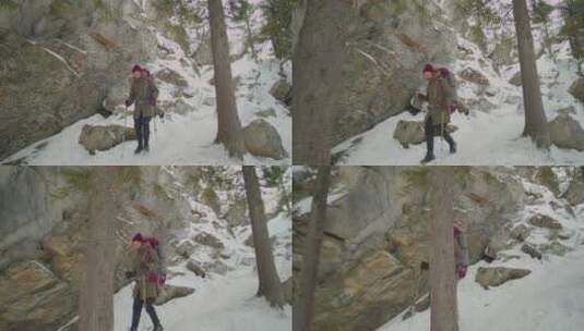 徒步旅行者在山中缓慢前进高清在线视频素材下载