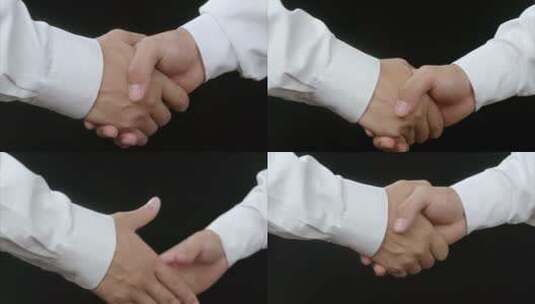 黑背握手 碰拳 加油打气相互鼓励合作成功高清在线视频素材下载