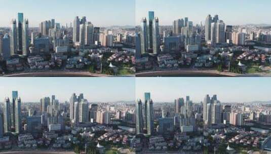 航拍青岛城市海岸线金融区建筑景观高清在线视频素材下载