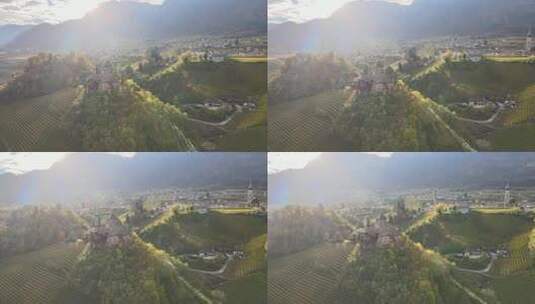 意大利阿尔卑斯山葡萄园中间中世纪城堡的空中无人机视频。高清在线视频素材下载