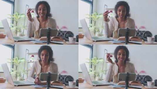 年轻的非裔美国女性导师使用三脚架上的电话进行在线课程高清在线视频素材下载