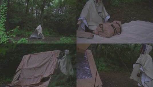 美女森林露营大雨中美女搭建帐篷高清在线视频素材下载