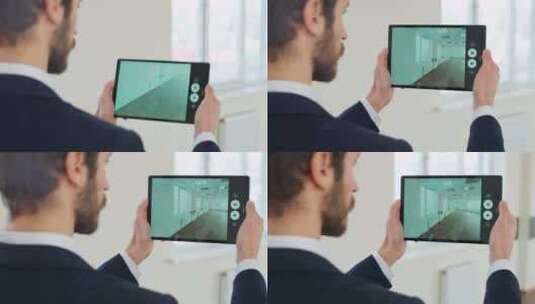 建筑师使用数字平板电脑在附加现实的帮助下扫描办公空间高清在线视频素材下载