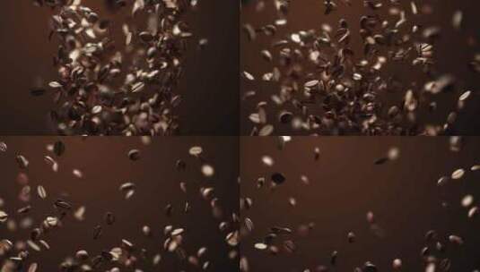 坠落的烘焙芳香咖啡豆的慢镜头高清在线视频素材下载