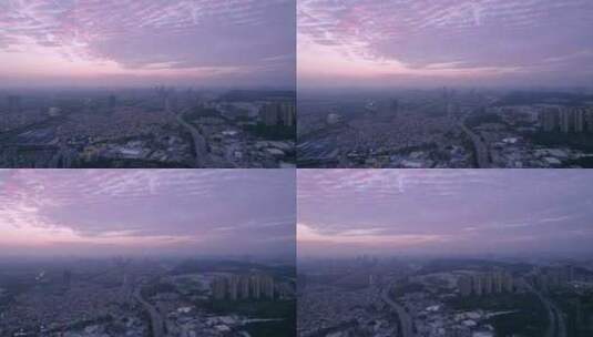 广州番禺城市高楼建筑与夕阳晚霞火烧云航拍高清在线视频素材下载