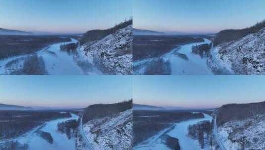 鸟瞰黎明时的林海雪原冰封河流高清在线视频素材下载