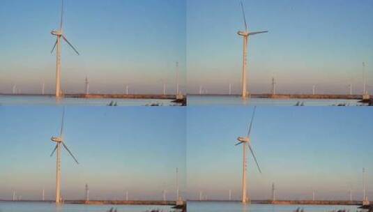 湖泊风力发电机组乡村振兴环保能源高清在线视频素材下载