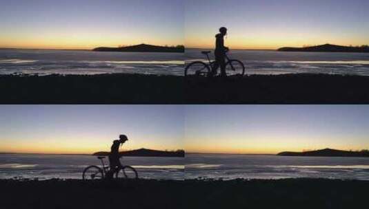 日落时分骑自行车的男孩剪影高清在线视频素材下载