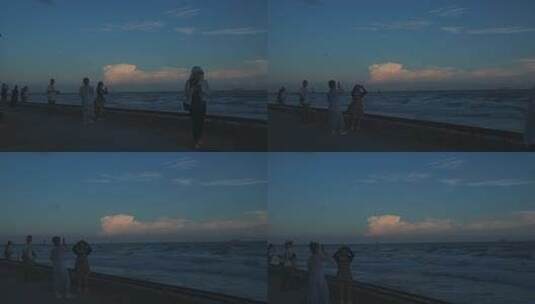 海边的人们欣赏着海景高清在线视频素材下载