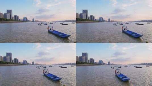 船舶穿梭杭州钱塘江和钱江新城夕阳下航拍高清在线视频素材下载