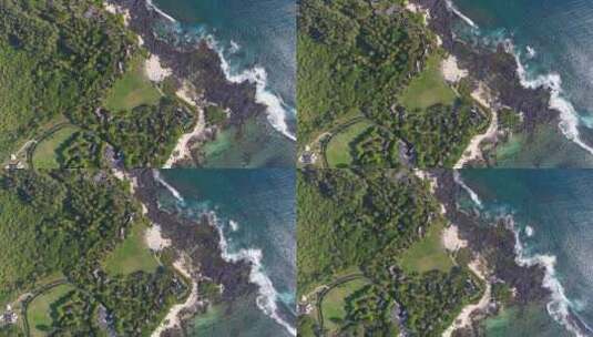 俯拍大海礁石海浪海岸线度假村高清在线视频素材下载