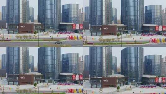 航拍江苏盐城现代商业圈建筑新龙广场新弄里高清在线视频素材下载