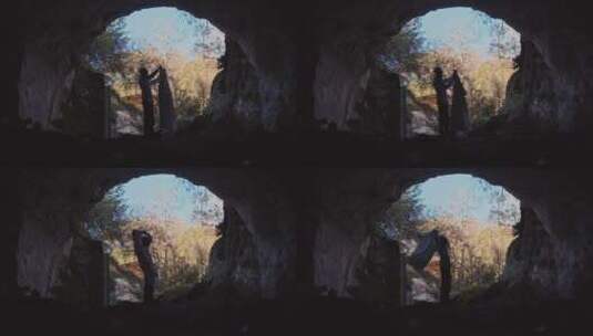洞穴里祈祷的男人高清在线视频素材下载
