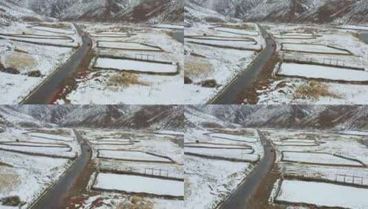 航拍川藏线上大雪覆盖的牧民村庄高清在线视频素材下载