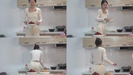 漂亮女人在厨房端菜2高清在线视频素材下载