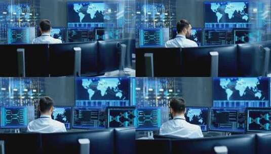 系统中心操作员在控制室操控多个屏幕高清在线视频素材下载