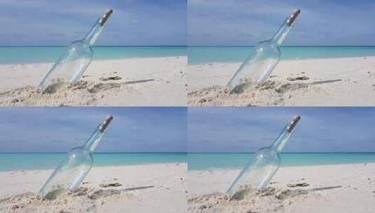 沙滩上的玻璃瓶高清在线视频素材下载
