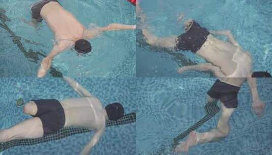 腿部残疾的人在游泳池练习游泳高清在线视频素材下载