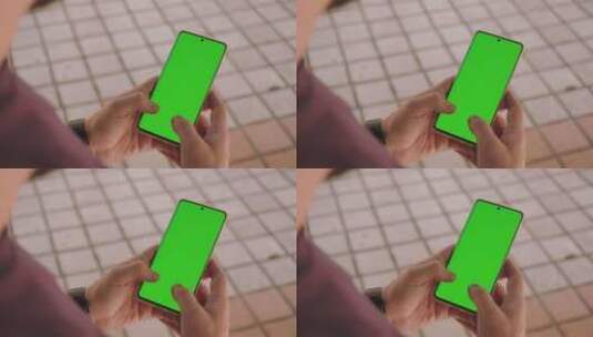 男人用绿屏智能手机写短信高清在线视频素材下载