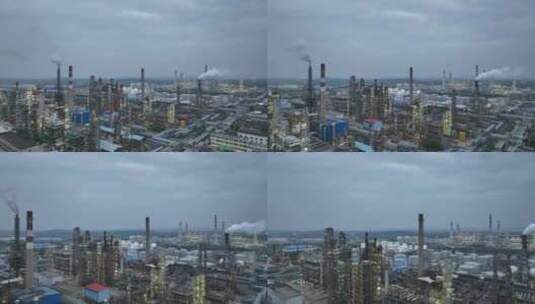 大型石油化工企业炼油厂傍晚亮灯时特写航拍高清在线视频素材下载