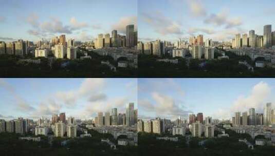 深圳日出后城市高楼光线和蓝天白云变化延时高清在线视频素材下载
