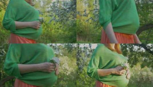 一名孕妇在林地中行走高清在线视频素材下载
