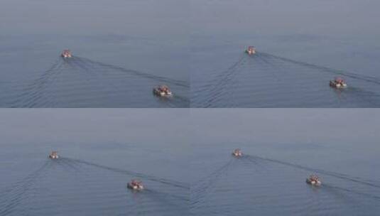旅游景区 航拍太湖鼋头渚两艘快艇 驶离 拉高清在线视频素材下载