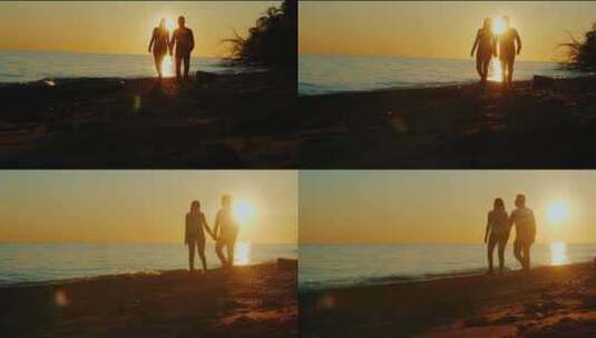 情侣在海边牵手看日出日落剪影高清在线视频素材下载