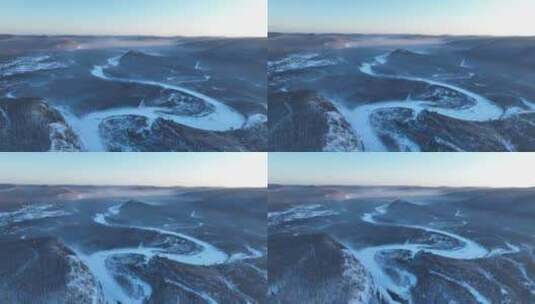 鸟瞰黎明时的林海雪原冰封河流高清在线视频素材下载