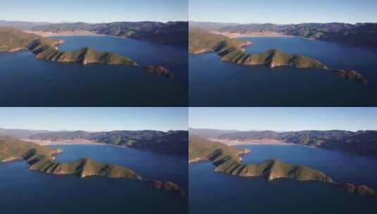 云南丽江泸沽湖湖中的岛屿日落黄昏航拍实时高清在线视频素材下载