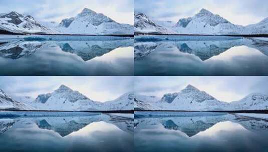 雪山倒映在湖中的唯美自然景观高清在线视频素材下载