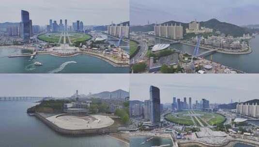 大连星海湾海水浴场城市海岸线航拍高清在线视频素材下载