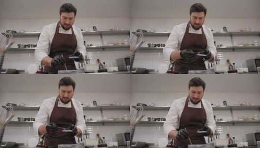 糕点师在专业糕点店制作手工巧克力的特写镜高清在线视频素材下载
