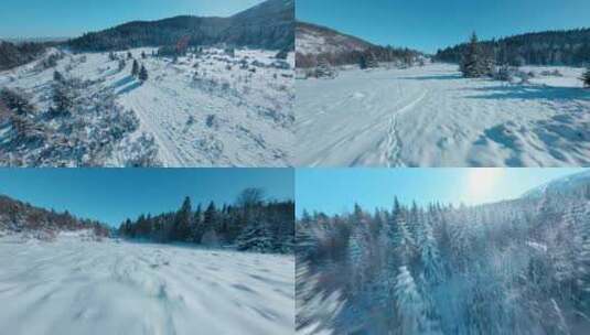 FPV航拍雪景雪地日出阳光照射森林蓝天云高清在线视频素材下载
