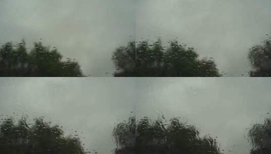 下雨天窗户外风景雨滴滴落在窗户雨水车窗外高清在线视频素材下载