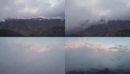 航拍梅里雪山穿云高清在线视频素材下载