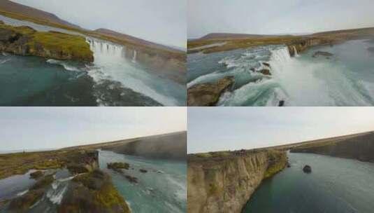 FPV拍摄了游客观看冰岛戈达福斯瀑布的照高清在线视频素材下载